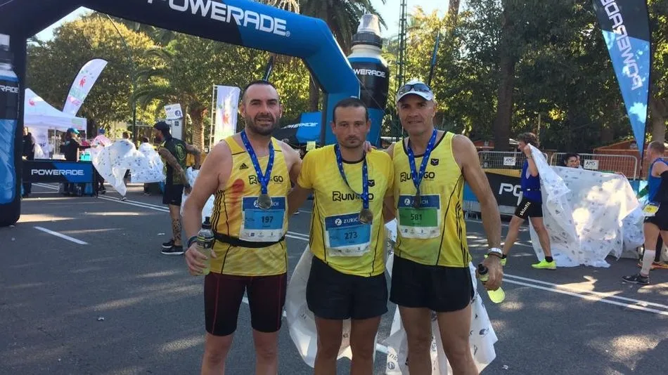 Los tres corredores de la Media Maratón de Málaga.