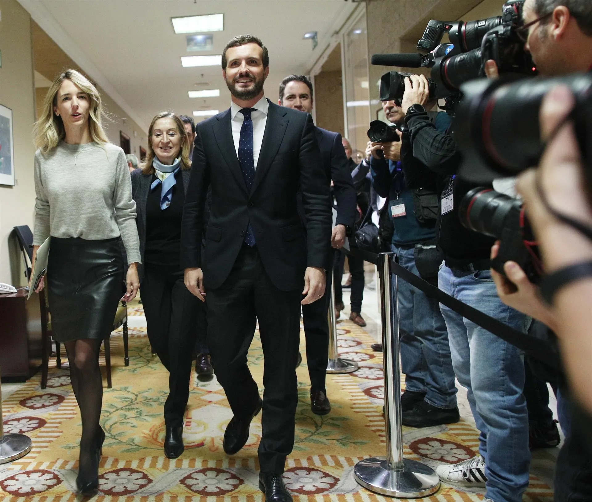 Casado, sonriente en un acto