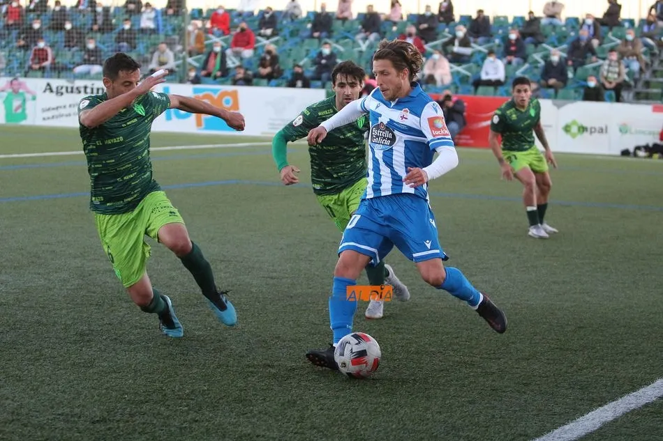 Foto 11 - El Guijuelo logra un buen punto en el Municipal frente al todopoderoso D&eacute;por (0-0)