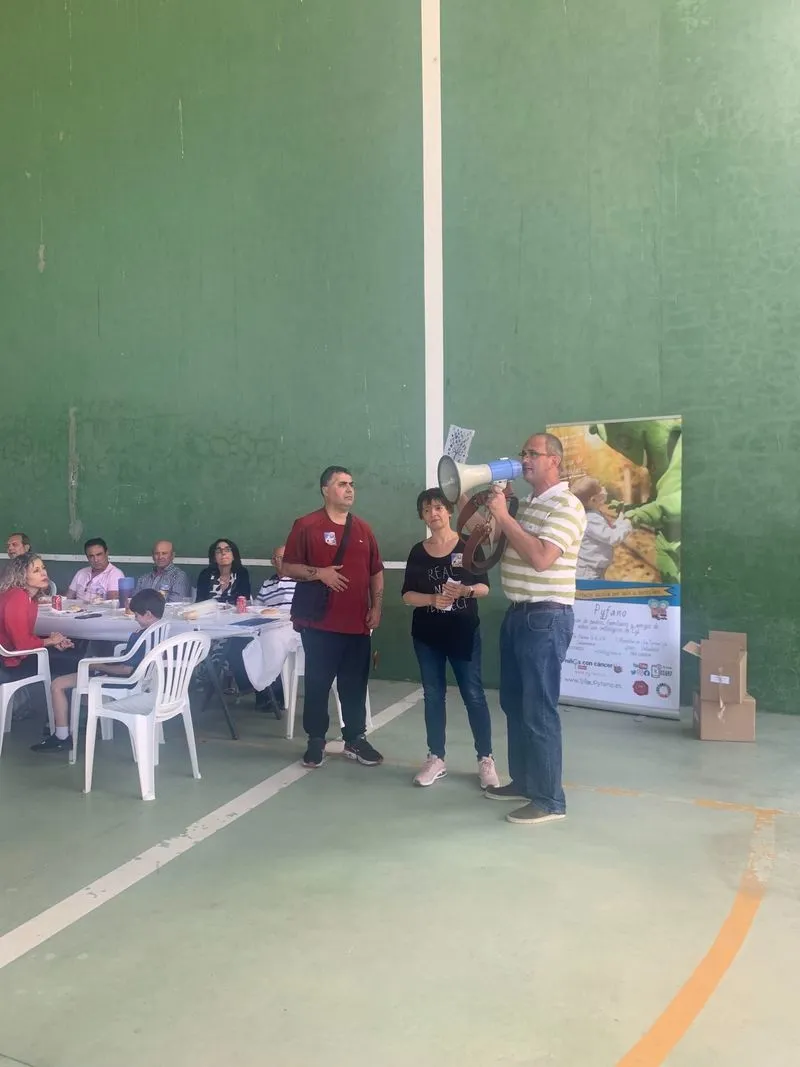 Imágenes de la paella en Peñarandilla en solidaridad con Pyfano