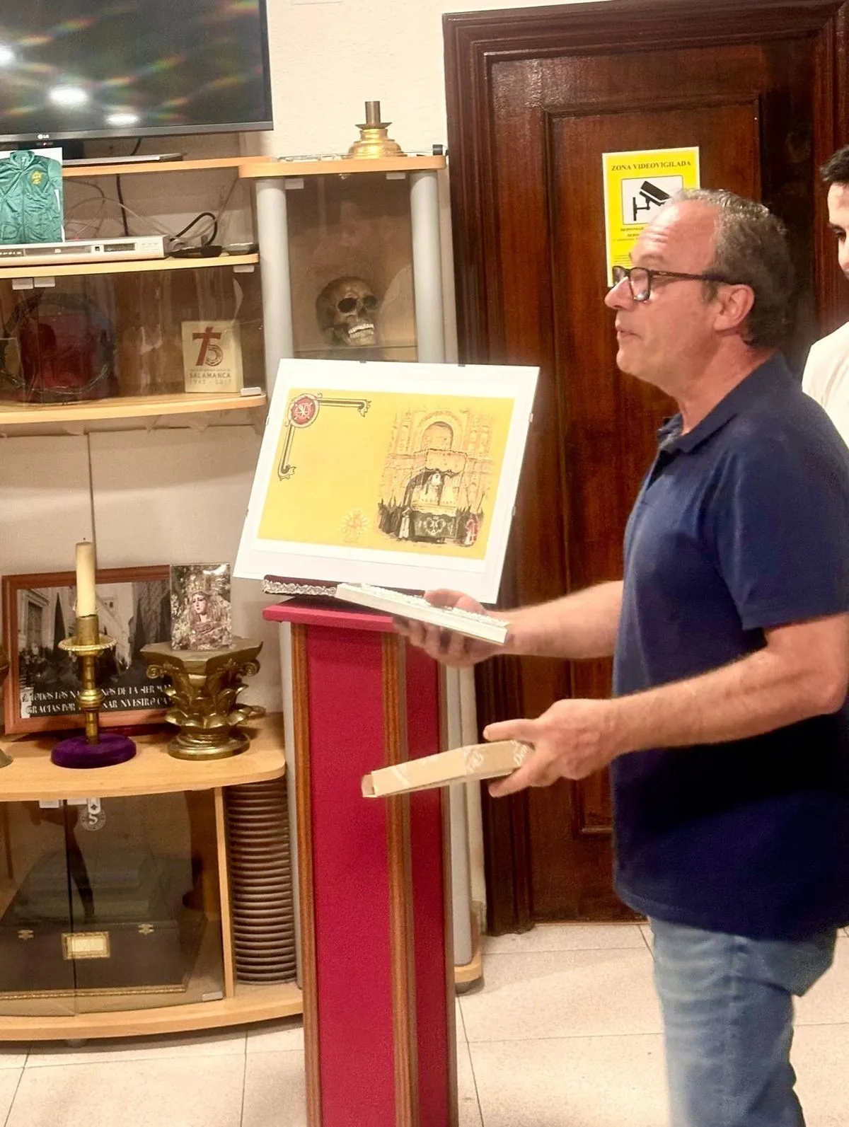 Presentación del cartel anunciador y de la papeleta de salida de la procesión de la Virgen de la Esperanza el próximo septiembre