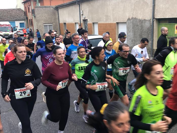FOTOS | David Ruano y María José Carpio ganan la Carrera Navideña de San Cristóbal de la Cuesta