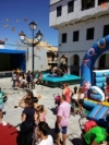 Foto 2 - Niños y mayores se divierten en el Gran Parque de Atracciones instalado en la Plaza Mayor